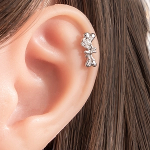 Cute silver dog bone cartilage stud earring with flower and bow detail for women