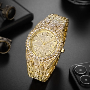 Luxurious gold-tone fully iced out men's watch with date display on dark textured background