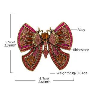 Vintage gold butterfly brooch with pink and red rhinestones for coats and sweaters