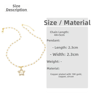 Close-up of pearl necklace featuring a gold star pendant with Mama lettering and zircons