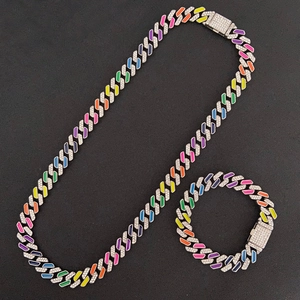 Detail view of rainbow-colored Cuban chain set with sparkling rhinestones and silver clasp