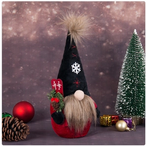 Detailed view of Christmas gnome with snowflake hat and red skis holiday ornament