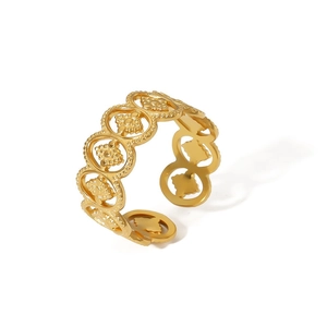 Detailed side view of a gold-plated stainless steel hollow floral ring with open band