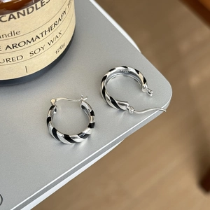 Chic silver and black zebra striped S925 sterling silver hoop earrings with enamel details