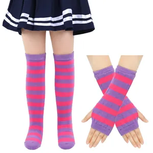 Detail view of pink and purple striped knit long socks and arm warmers for girls