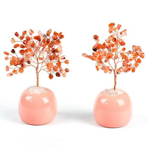 Pair of orange crystal money trees with copper wire branches in pink ceramic pots