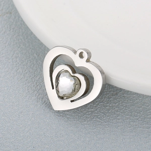 Silver hollow heart pendant necklace with sparkling crystal inlay in titanium steel