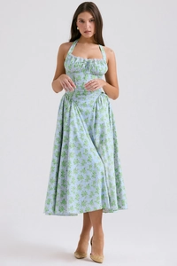 Detail of blue floral maxi dress with pleated bust and delicate lace trim accents