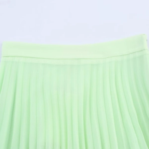 Light green pleated casual skirt featuring fine fabric texture and elastic waistband
