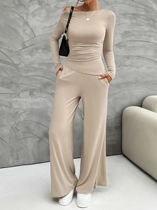 Slim fit beige off-shoulder long sleeve top and wide leg pants set on model