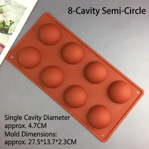 Detailed view of 8-cavity semi-sphere silicone mold with dimensions 27.5x13.7x2.3cm