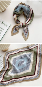 Close-up of pleated silk scarf with geometric patterns and unique serrated edges