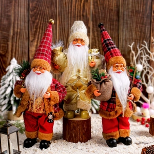 Three standing Santa Claus dolls in red and gold outfits for Christmas home decor