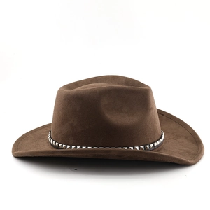 Detail of dark brown suede fedora featuring decorative silver studs and classic pinched crown