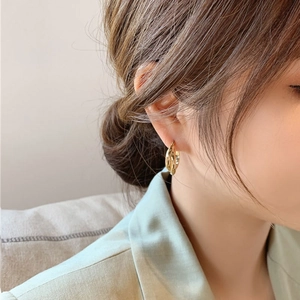 Chic gold double-layered twisted hoop earrings for women in minimalist geometric style