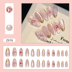 3D floral cat-eye press-on nails in pearlescent pink with elegant gold French tips
