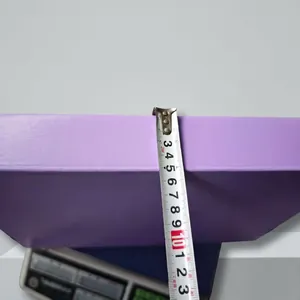 Detail shot showing measurement of a purple DIY craft kit box depth of 11.5cm