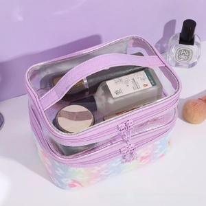 Detail view of double-layer purple makeup bag with snakeskin texture and clear windows