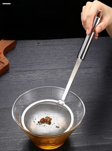 Detail of 304 stainless steel fine mesh oil skimmer spoon with a long handle and hanging hole