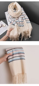 Detail of soft beige plaid scarf with pink stripes and delicate tassel hem decoration