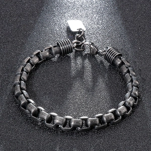 Industrial vintage titanium steel bracelet featuring detailed textured link ring loops