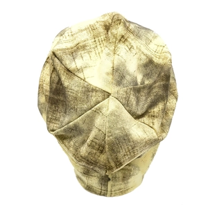 Close-up of vintage tie-dye beanie top with retro textured pattern and stitched seams