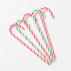 Detail of red green and white striped candy cane ornaments for Christmas tree decor