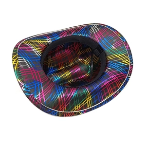Detail of colorful plaid cowboy hat featuring internal sweatband and 100% polyester label