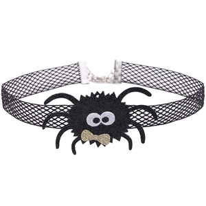 Gothic Halloween choker featuring a black mesh band and a plush spider with a gold bow