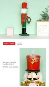 Macro detail of hand-painted wooden nutcracker soldier with white feather hat and wreath