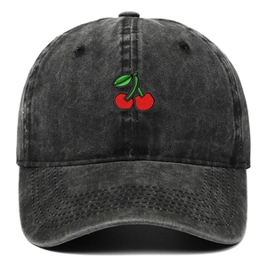 Close-up of red cherry embroidery on black washed denim baseball cap with vintage finish