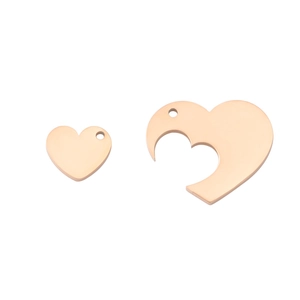 Rose gold heart puzzle pendant set with polished finish on a white background