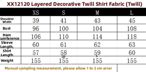 Detailed size chart for layered poplin shirt with shoulder, chest, and length measurements