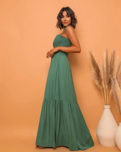 Detail of forest green maxi dress with pleated bodice and delicate spaghetti straps
