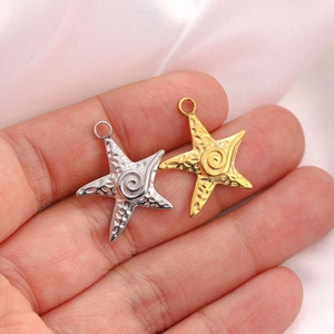 Handheld gold and silver starfish pendants with textured finish for DIY jewelry