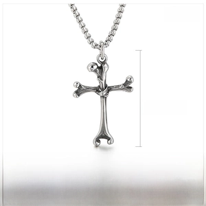 Macro detail of gothic stainless steel cross bone pendant with technical dimensions