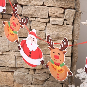 Christmas paper banner featuring festive cartoon Santa Claus and reindeer ornaments