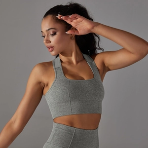 Detail view of seamless grey sports bra featuring honeycomb mesh and ribbed texture
