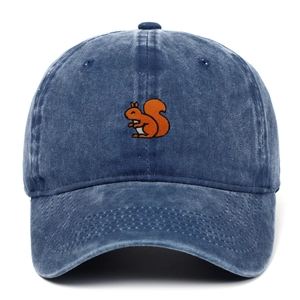 Close-up of vintage blue washed cotton baseball cap with orange squirrel embroidery