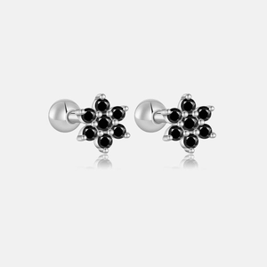 Detail of silver S925 flower earrings with black zircon stones and screw back closure