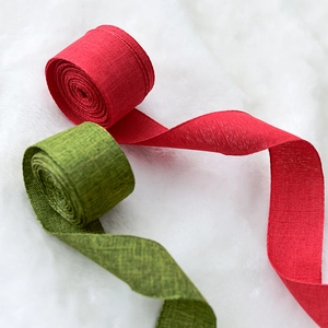 Red and green Christmas burlap ribbons for DIY bows and festive tree decorations