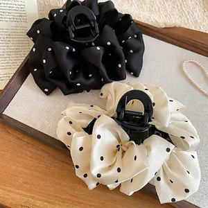 French vintage polka dot fabric claw clips in black and beige for high ponytails