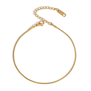 Detail of gold stainless steel snake chain anklet with lobster clasp and S.Steel tag