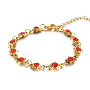 Golden stainless steel star bracelet with red crystal charms and lobster clasp