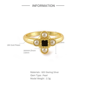 Detail of 925 silver 18K gold ring with quartet pearls and square black zircon