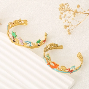 Golden stainless steel ocean theme open cuff bracelets with colorful enamel sea motifs