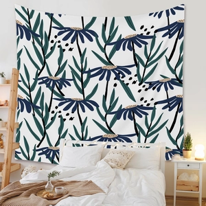 Artistic wall tapestry with blue floral patterns displayed in a modern bedroom setting