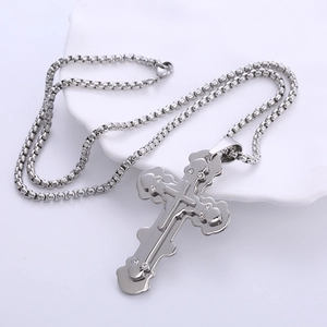 Polished stainless steel triple layer cross pendant necklace with diamonds on tray