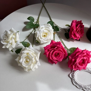 Artificial 3-head silk roses in white and pink, realistic wedding flowers on a white table