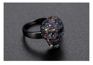 Macro shot of skull ring with black plating and colorful micro-pave zirconia stones